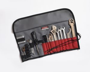Description: The perfect travel tool kit for Chief, Chieftan, Roadmaster and Scout model Indian Motorcycles. The kit includes a pair of 27mm axle wrenches, a 14mm x 16mm hex axle adapter, a shock adjustment tool, wrenches, sockets, hex and torx keys. Also includes a mini ratchet with 2” extension and sockets, 6-in-1 screwdriver, locking pliers, tape and more in a durable roll-up pouch. Lifetime Guarantee - no questions asked! Features: The perfect travel tool kit for Chief, Chieftan, Roadmaster and Scout model Indian Motorcycles. The kit includes a pair of 27mm axle wrenches, a 14mm x 16mm hex axle adapter, a shock adjustment tool, wrenches, sockets, hex and torx keys. Also includes a mini ratchet with 2” extension and sockets, 6-in-1 screwdriver, locking pliers, tape and more in a durable roll-up pouch. Compact for easy storage on the bike and ideal for roadside repairs and adjustments. Lifetime Guarantee - no questions asked!