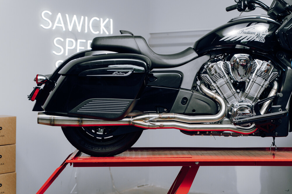 Designed with performance and additional ground clearance in mind while offering a custom look and a powerful sound. This pipe offers a horsepower heavy tune with similar gains in torque. 8HP and 10 TQ increase over stock 23 lbs weight savings over stock (40 lbs stock / 17 lbs Sawicki) 1 7/8" primaries stepped to 2” Hand-formed merge collector allows precise flow performance. Mandrel bent, aircraft-quality 304 Stainless Steel Comes with standard mounting hardware, brackets, including all bag support mounts for Challengers and Pursuits Clears OEM saddlebag crash bars Available in hand brushed stainless steel, Jet-Hot Ceramic Coated Black, and Mirror Polished finishes Limited Lifetime Warranty Made in the USA Fitments: 2019-2024 Indian Challenger, Challenger Pursuit, Challenger Dark Horse, Challenger Limited, Challenger Elite, Pursuit Dark Horse, Pursuit Limited
