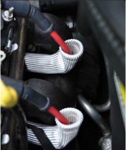 Protect-A-Boots are the latest in thermal protection technology for spark plug boot protectors. Developed from a unique material mined from lava rock, stranded and woven into a proprietary weave for added durability and strength, yet is pliable enough to provide a universal fit for straight or angled boots. Titanium Protect-A-Boots are naturally resistant to heat, chemicals, abrasions and contaminants, and are engineered to withstand temperatures up to 1800°F (983°C) of direct heat. High horsepower engine compartments are known for extreme heat that can put spark plug boots and wires at risk. With excessive heat generated from the exhaust manifold and headers the ignition system is vulnerable to the potential of burning, hardening and cracking of ignition wires and boots that could lead to arching, engine misfire and potential ignition system failure. Titanium Protect-A-Boots, with LR technology, are engineered to handle extreme heat, providing the ultimate protection for today's high voltage ignition systems for many applications including automotive, marine and powersports. The color and weave work together to give DEI's Titanium Protect-A-Boots a "cool" carbon fiber appearance that looks great under the hood – ideal for race, street, show cars and off road vehicles. Ultimate protection for spark plug boots & wires Withstands heat up to 1800°F (983°C). Our 6’’ Titanium Protect-A-Boots come with a reinforcement ring at the base for easy plug removal during maintenance. When working on boots with tight bends, try our 8’’ Titanium Protect-A-Boot XL Ringless instead. For thicker boots, like MSD or Taylor’s, we recommend our Protect-A-Boot Ringless Sleeves; the 1.25’’ diameter will allow for a simple install. Ultimate protection for spark plug boots & wires Non-flammable & protects against chemicals & resists water Double-wall construction for added durability Cool carbon fiber look Boots measure 6" L 2 boots per pack Reinforcement ring at the base for easy plug removal during maintenance Length: 6 inch ID: 1 inch Pack: 2-Pack Boot Angle: Straight