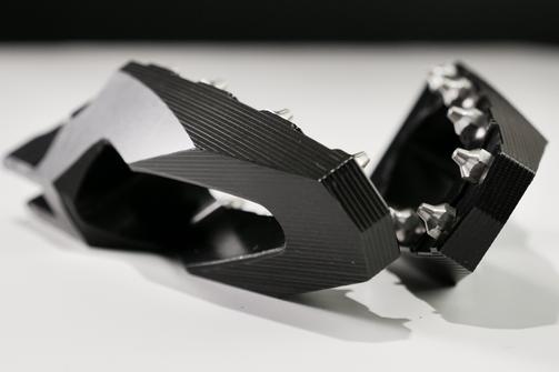 Designed specifically for the Indian Motorcycle, these foot pegs have the style your bike deserves. They are not just another clunky billet foot peg the design rates very high on our list of priorities and it shows with these foot pegs and their arrowhead accents. Made of lightweight billet aluminum these are likely the only foot pegs you can buy for you Indian Motorcycle that include a spring to push the foot peg down, where it belongs. Designed to be thinner at the end, they can allow you to get lower in the corners when you are carving through the twisties. The stainless steel cleats give your foot grip that far exceeds other foot pegs, especially when you get caught out in that rain storm.